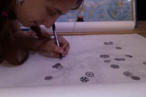 Inking the illustration for chapter C: the magical rowan tree. Mandalas feature prominently in the scroll.