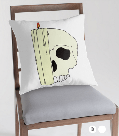 Really, why not? Skull candle letter D on a throw pillow livens up any room.