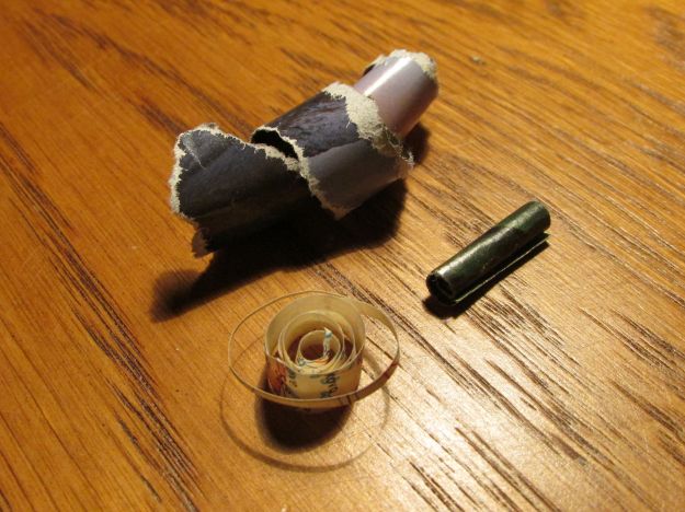 I'm just as likely to curl paper as to fold it. With the right material to hold their form, these scraps could easily be beads.