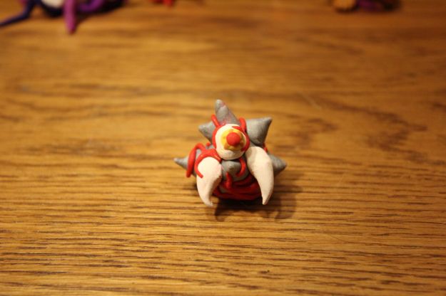 Sharp spikes, massive fangs, throbbing veins, bloodshot, wide-awake eye